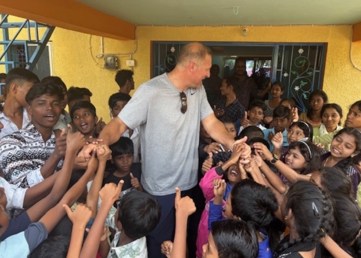 Ryan with orphans